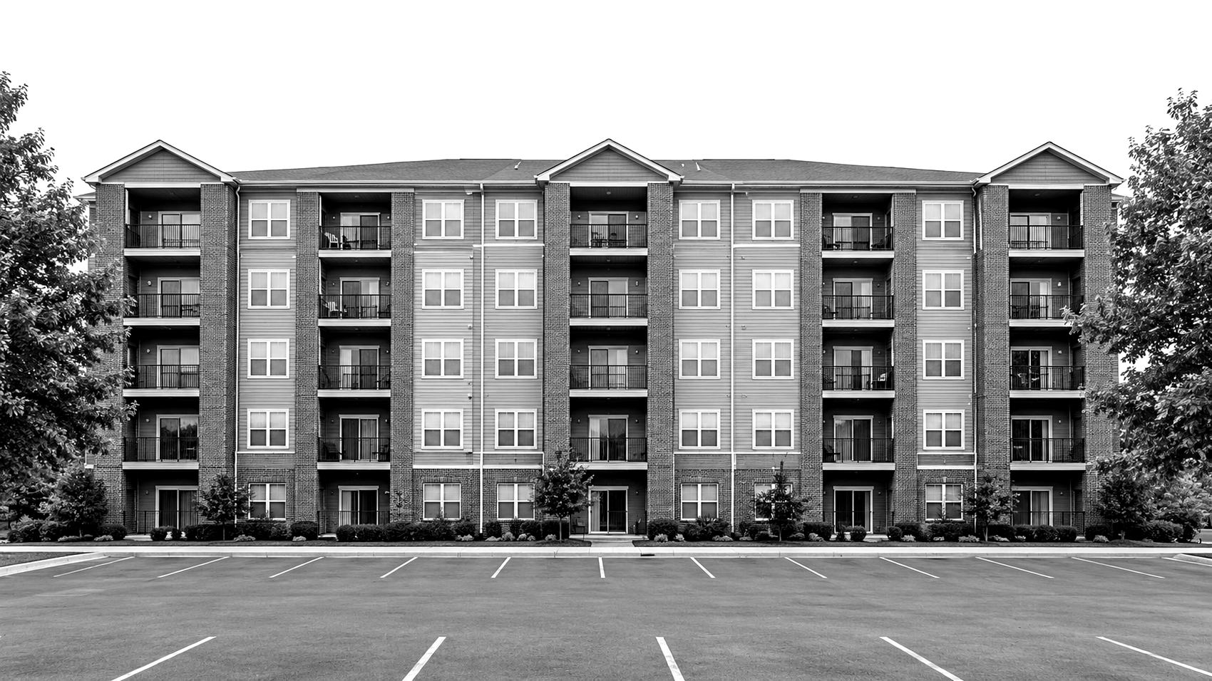 Elevation of a four-storey garden-style apartment building